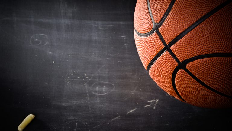 close up of basketball on chalkboard