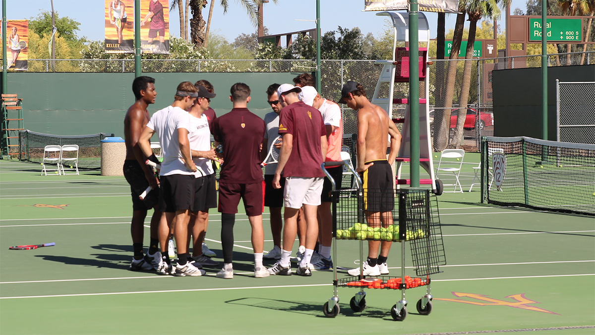 ASU men's tennis in a huddle