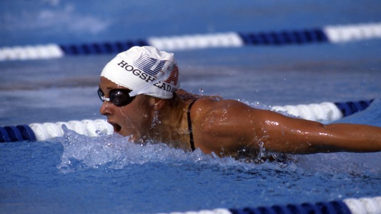 Nancy Hogshead-Makar competes in an olympic swimming event for the United States