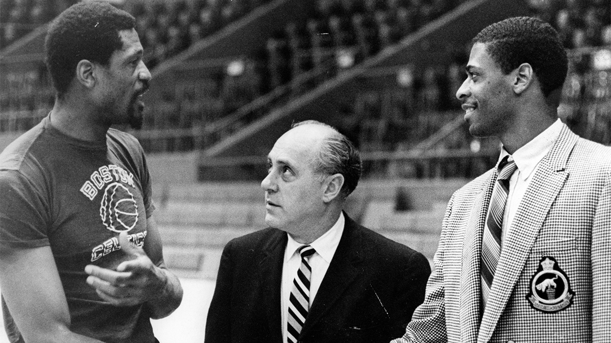 Bill Russell speaks to Red Auerbach and Don Chaney