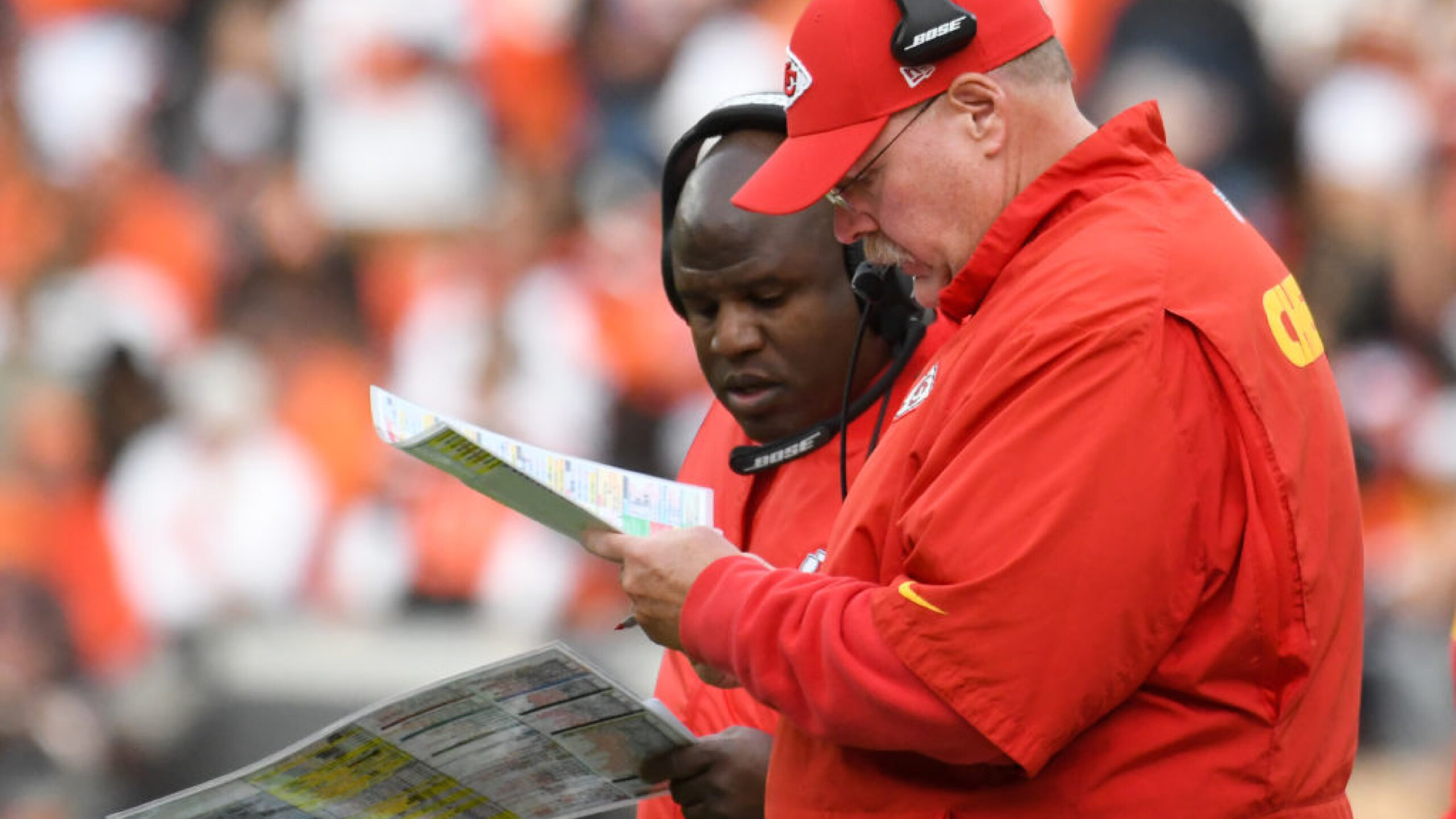 CLEVELAND, OH - NOVEMBER 4, 2018: Head coach Andy Reid and offensive coordinator Eric Bieniemy of the Kansas City Chiefs talk on the sideline in the fourth quarter of a game against the Cleveland Browns on November 4, 2018 at FirstEnergy Stadium in Cleveland, Ohio. Kansas City won 37-21. (Photo by: 2018 Nick Cammett/Diamond Images/Getty Images)