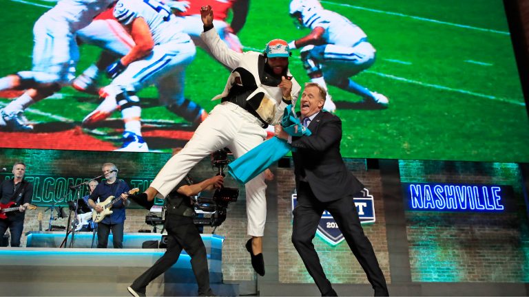 NASHVILLE, TENNESSEE: Christian Wilkins of Clemson celebrates with NFL Commissioner Roger Goodell after being chosen #13 overall by the Miami Dolphins during the first round of the 2019 NFL Draft on April 25, 2019 in Nashville, Tennessee. (Photo by Andy Lyons/Getty Images)