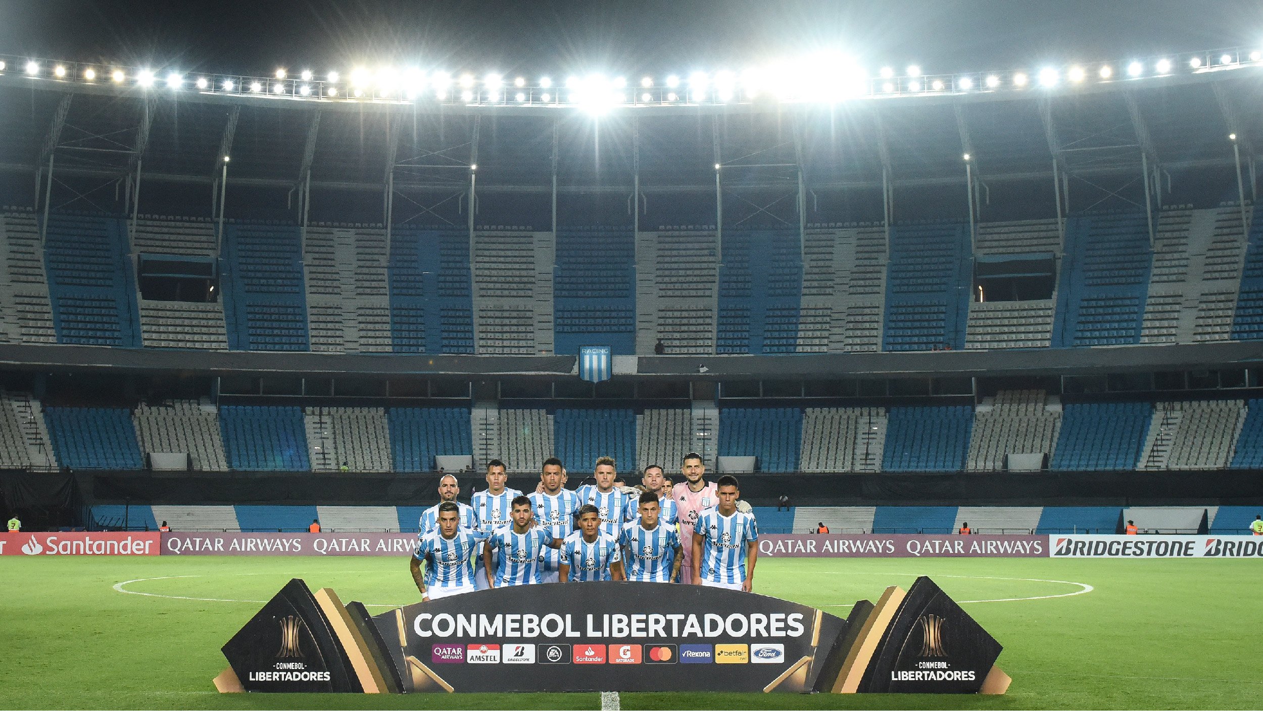 AVELLANEDA, ARGENTINA - MARCH 12: Players of Racing Club pose for the team photo prior to a Group F match between Racing Club and Alianza Lima as part of Copa CONMEBOL Libertadores 2020 at Juan Domingo Peron Stadium on March 12, 2020 in Avellaneda, Argentina. The match is played behind closed doors to prevent the spread of the novel Coronavirus (COVID-19). (Photo by Marcelo Endelli/Getty Images)