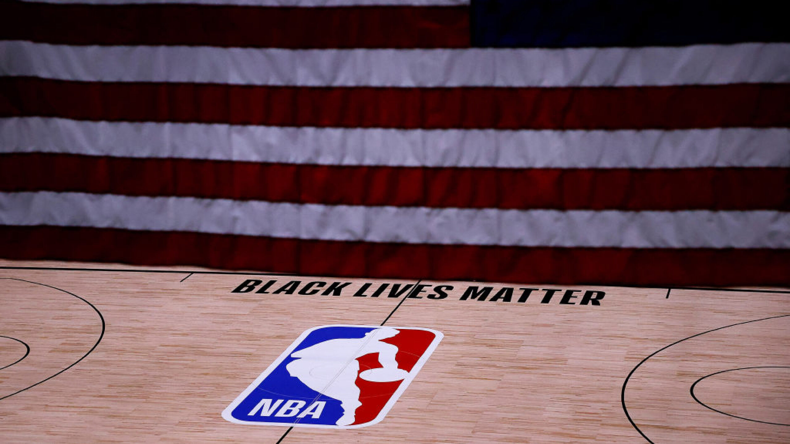 LAKE BUENA VISTA, FLORIDA - AUGUST 27: The Black Lives Matter logo is seen on an empty court as all NBA playoff games were postponed today during the 2020 NBA Playoffs at The Field House at ESPN Wide World Of Sports Complex on August 27, 2020 in Lake Buena Vista, Florida. NBA players have reportedly decided to resume the season after their walkout of playoff games on Wednesday to protest the shooting of Jacob Blake in Kenosha, Wisconsin. (Photo by Kevin C. Cox/Getty Images)