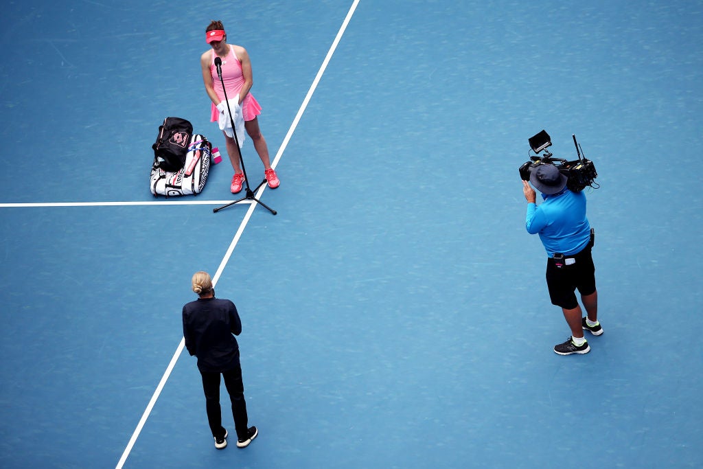 MELBOURNE, AUSTRALIA - FEBRUARY 01: Alize Cornet of France is socially distanced interviewed on court following her Women's Singles Round of 64 match against Ajla Tomljanovic of Australia during day two of the WTA 500 Gippsland Trophy at Melbourne Park on February 01, 2021 in Melbourne, Australia. (Photo by Jack Thomas/Getty Images)