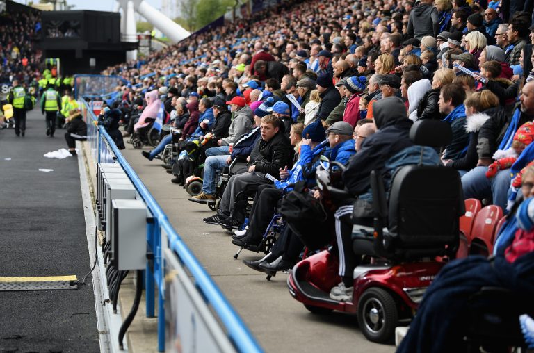 Disabled sports fans take in a live event.