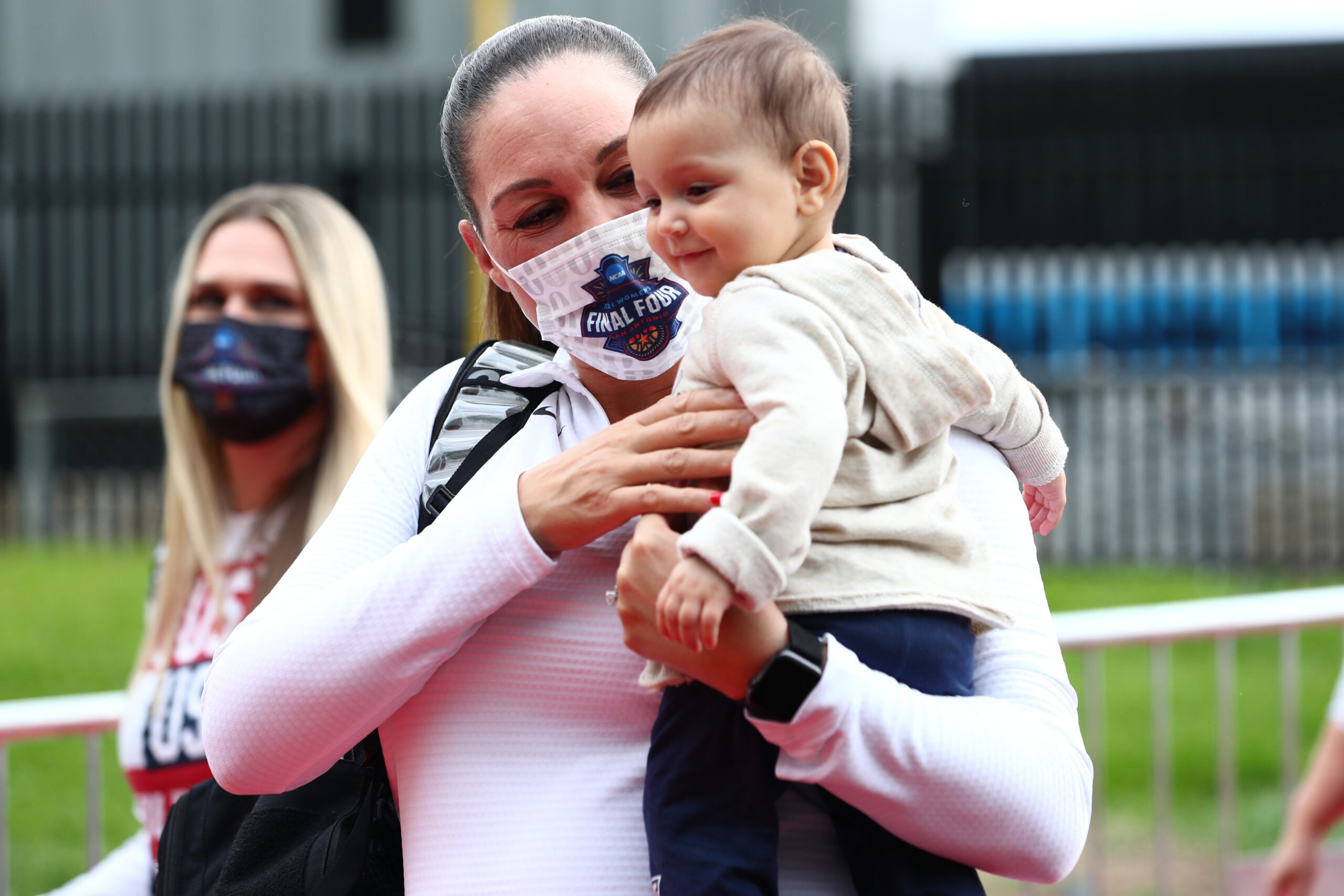 Arizona head coach Adia Barnes of the Arizona Wildcats arrives the the Alamodome with her five-month old child before the championship game against the Stanford Cardinal of the NCAA Women’s Basketball Tournament at Alamodome on April 4, 2021 in San Antonio, Texas. (Photo by C. Morgan Engel/NCAA Photos via Getty Images)