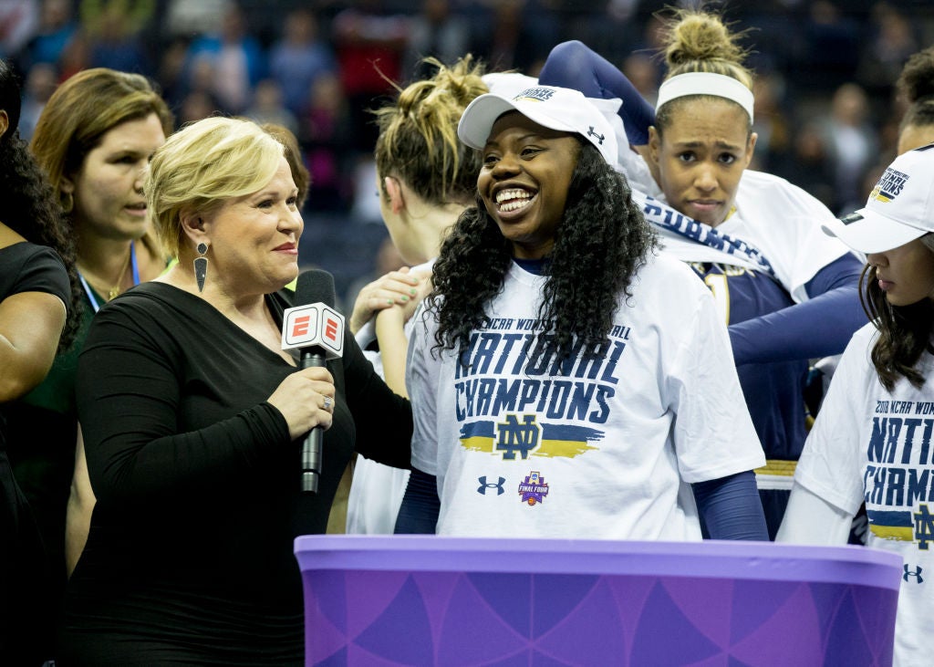 Arike Ogunbowale and Holly Rowe