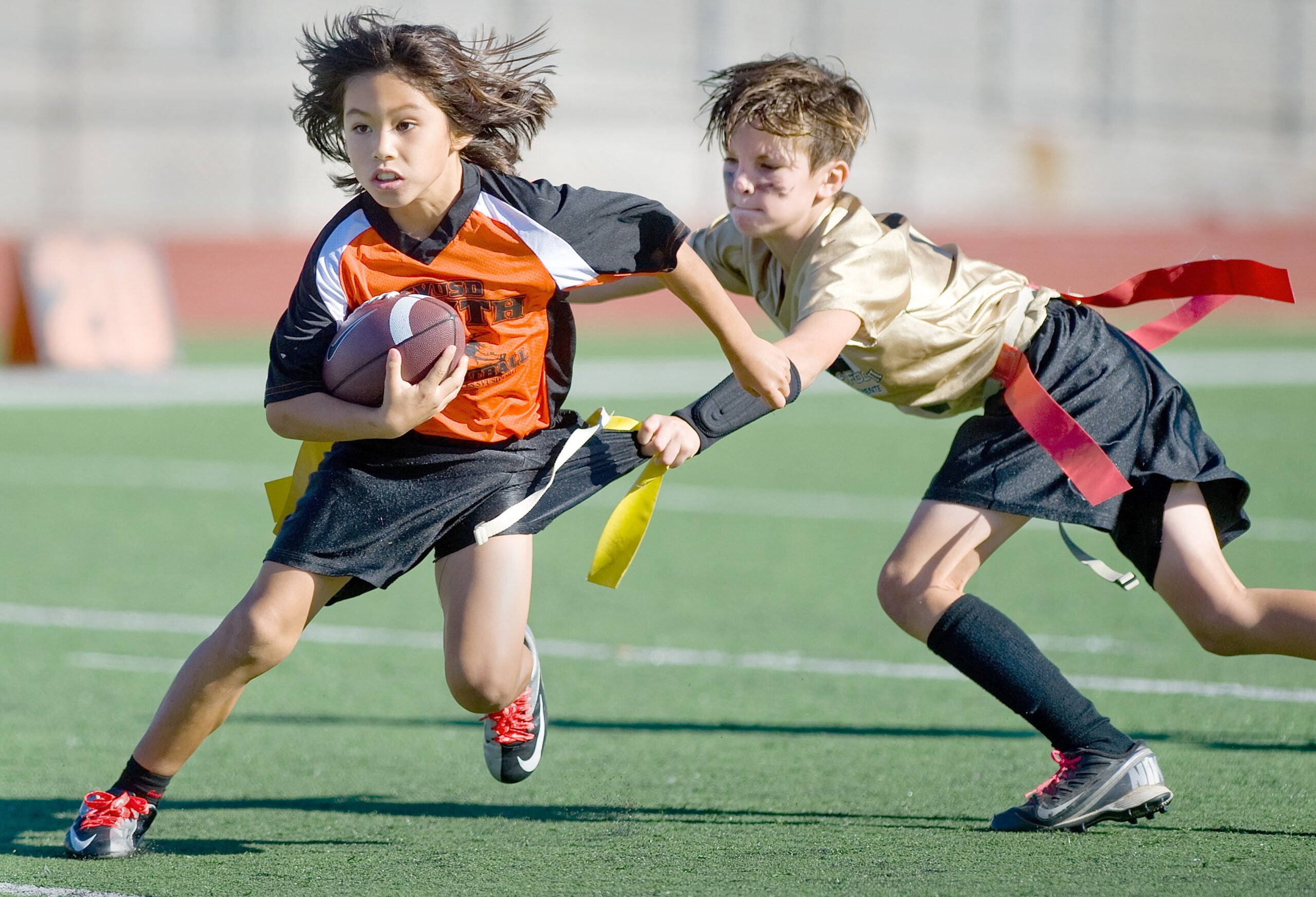 Youth flag football athletes